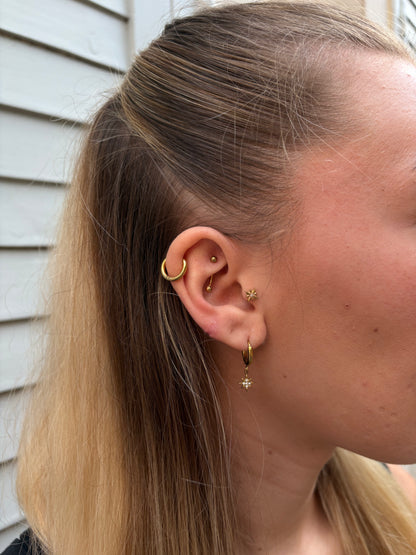 Boucles d'Oreilles Créoles Stella - Étoiles en Strass Dorées