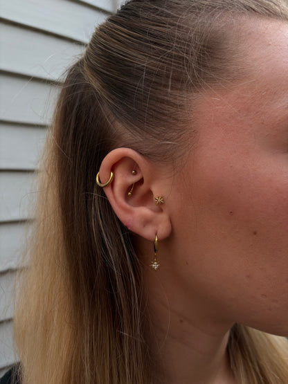 Boucles d'Oreilles Créoles Stella - Étoiles en Strass Dorées